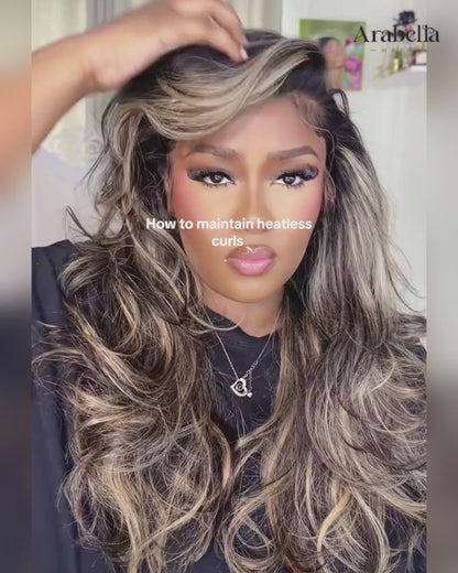 Woman styling Arabella Hair platinum blonde ombre loose body wave human hair wig in tutorial video.
